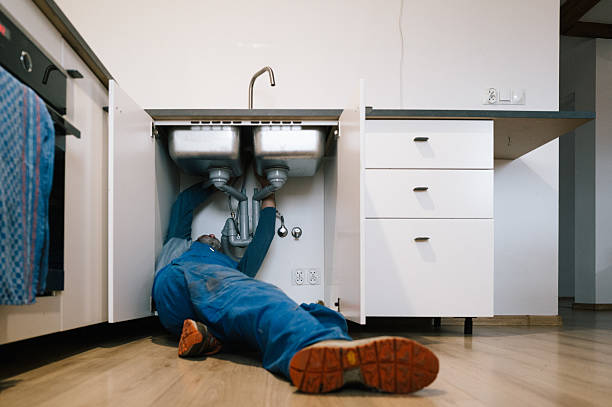 Professional Drain Cleaning technician working in Concord, NH